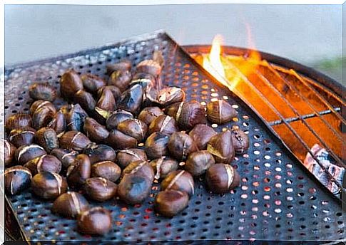 Chestnuts roasting over a fire.