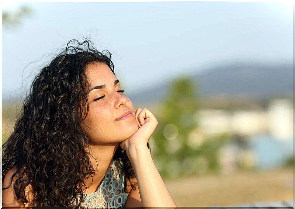 Woman in the light of the sun